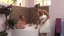 Janett is a busty lady whose husband loves taking bubble baths. She's ready to fuck however, so she seduces him by flashing her upper thighs