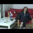Archive girl chilling in her flat wearing sexy shiny nylon rainwear (Video)