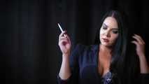 Alluring wonder woman Tanya enjoying a white 120mm cigarette