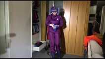 Watching Mara while she tidies up the ropes wearing a sexy purple shiny rain pants and a rain jacket (Video)