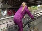 Get a Video with Sandra riding her bike enjoying her shiny nylon Rainwear