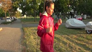 Watch Sandra taking a Walk during very hot Weather enjoying her rubberized oldschool Rainsuit