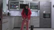 Miss Amira in red nylon rain gear and tranparent rain suit get´s bouind and gagged