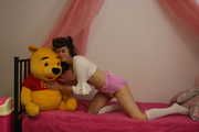 In bed with Pooh bear