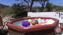 a jakuzzi full of balloons