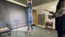 Ms ungeniert tied, gagged, suspended ind a shiny nylon Rainsuit and finally bullwhipped