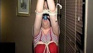 25 Yr OLD 2nd GRADE SCHOOL TEACHER IS CLEAVE GAGGED, BALL GAGGED, RING GAGGED, BAREFOOT, WHILE KNEELING WITH HER HANDS TIED UP IN THE AIR (D71-13)