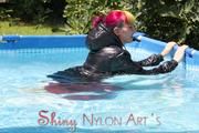 Mara sunbathing and swimming wearing supersexy crazy sensation shiny nylon downwear (Pics)