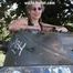 Nathalie poses on a Hotchkiss armored personnel carrier