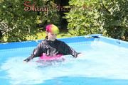 Mara wearing a supersexy 3/4 adidas pants and a supershiny pink/black rain jacket while sun bathing and go swimming in the pool (Pics)