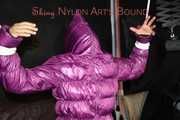 Sandra tied, gagged and hooded complete overhead with ropes and a clothgag wearing a sexy purple down jacket and a rain pant (Pics)