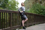 Miss Petra in a hot vinyl skirt, high heels and transparent blouse at photo shooting