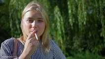 Pretty Polina is smoking 120 cork cigarette