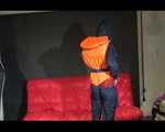 DESTINY wearing a sexy blue/red shiny nylon rain suit putting on a life jacket and posing (Video)
