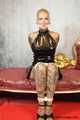 Miss Francine bound and gagged with layers of gags in a sexy PVC dress