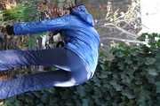 Watching sexy Destiny wearing a sexy blue shiny nlon downbib and a shiny nylon blue down jacket lingering around in the garden (Pics)