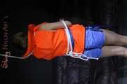 Sexy Sandra being tied and gagged overhead with ropes and a ballgag wearing a sexy shiny nylon shorts and a lifevest (Pics)