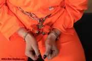 Prisoner in high security cuffs