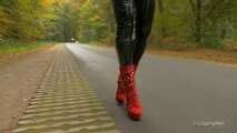 Black gloss leggings and red boots