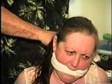 46 Yr OLD REAL ESTATE AGENT'S IS MOUTH STUFFED, CLEAVE GAGGED AND IS TIGHTLY TIED TO A CHAIR (D63-14)