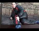 Jill putting on a sexy black downwear combination and blue rubber boots in an old cellar (Video)