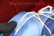 Lucy tied and gagged with a rope and a gag on a red sofa wearing an oldschool blue downwear combination (Pics)