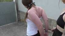 Public Bondage Walk Training with tied Elbows for Roxy