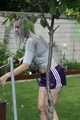 Watch Chloe watering the Garden enjoying her shiny nylon Shorts