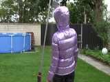 Watch Sandra taking a shower in her new purple shiny nylon down jacket 