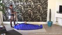 Mercy - being caught in the blue shiny nylon sleepingbag