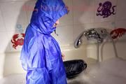 Sonja ties, gagges and hoodes herself in a bath tub wearing supersexy shiny nylon rainwear (Pics)