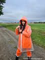 Miss Amira in AGU Adidas rain suit and transparent rain gear