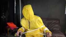 Sandra being tied and gagged on a hairdresser´s chair wearing sexy yellow shiny nylon rainwear being double hooded (Video)