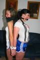 Jill and Petra tied and gagged in shiny shorts