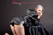 Mara wearing a sexy black shiny nylon shorts and a black rain jacket posing for you (Pics)