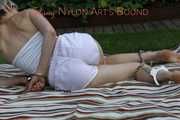 Watching Sonja wearing a hot white shiny nylon shorts and a white top bound herself and gag herself in the garden (Pics)