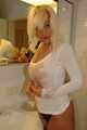 Natural beauty Martina posing in white shirt, black thong and stockings in bathroom