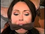 29 YR OLD CHIROPRACTOR GETS HER MOUTH STUFFED, 3 DIFFERENT CLEAVE GAGS, BAREFOOT, TOE -TIED & IS TIED TO A CHAIR (D67-8)