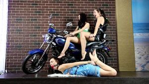 Lucky, Nelly, Xenia - Trio pose on motorbike, one girl ends up hogtied (video)