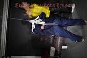 Sandra beeing tied and gagged by Stella in Shiny Nylon Rainwear crotchrope-suspended 