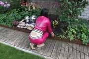 Watching Aiyana wearing supersexy pink shiny nylon rainwear while planting flowers in the garden (Pics)