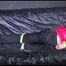 Pia wearing a supersexy black rain pants and a pink down jacket tied, gagged and hooded with cloth (Video)