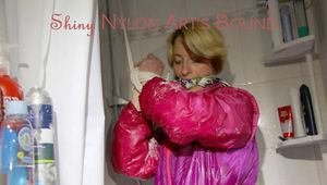 Sonja tied and gagged in an shower cabine wearing a supersexy oldschool pink shiny downwear suit (Pics)