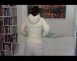 Jill enjoying herself on a sofa wearing white shiny nylon rain pants and a white down jacket (Video)