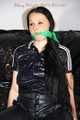 Lucy tied and gagged with rope and gag on a chair wearing a sexy black shiny nylon jumpsuit (Pics) 