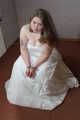 Sandra cuffed in a wedding dress 01