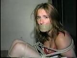 24 Yr OLD CRAFTER IS WRAP TAPE GAGGED, BAREFOOT TICKLED, TOE-TIED, BALL-TIED, HANDGAGGED & MOUTH STUFFED (D61-1)