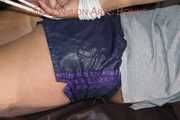 Watching Pia being tied and gagged on a sofa wearing a sexy shiny nylon shorts and a tshirt (Pics)