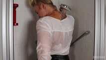Blonde Frida takes a shower in her white shirt and black glossy pants