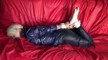Sexy Courtney being tied and gagged on a sofa wearing sexy shiny nylon rainwear (Video)